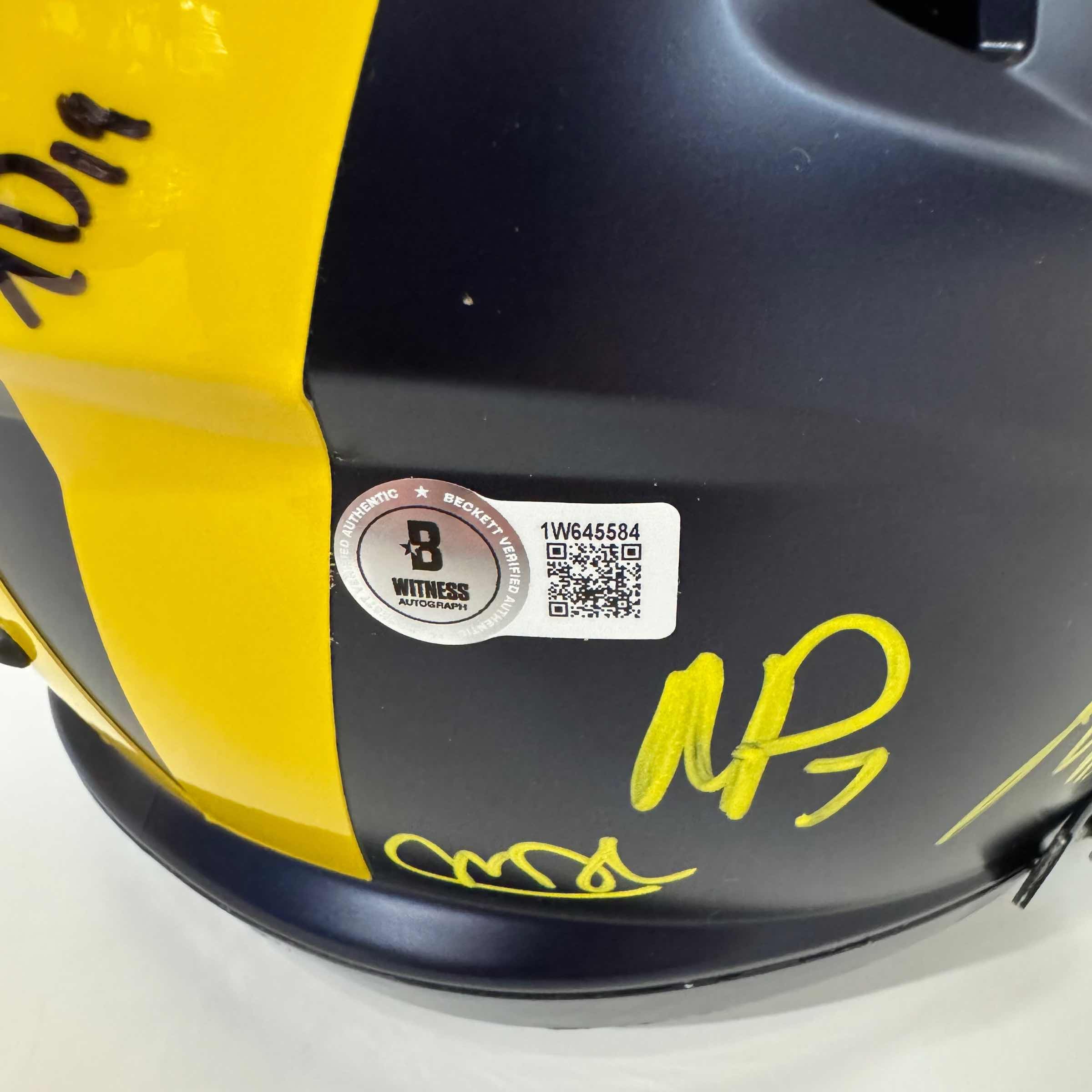 Autographed/Signed 2023 Michigan Wolverines Full-Size Speed Helmet Team-Signed by (16) with J.J. McCarthy, Blake Corum, Roman Wilson, Colston Loveland Beckett BAS COA